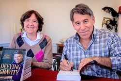 Carol de Giere and Stephen Schwartz signing Defying Gravity