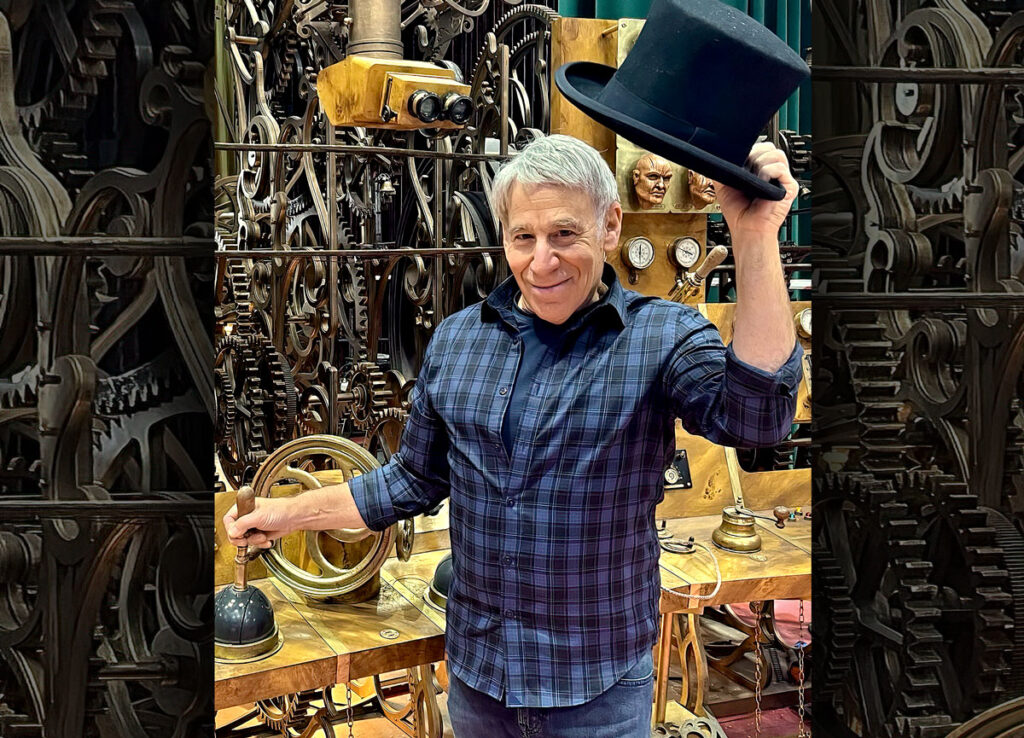 Wicked composer Stephen Schwartz visits the Wizard's workshop on the Wicked movie set. 