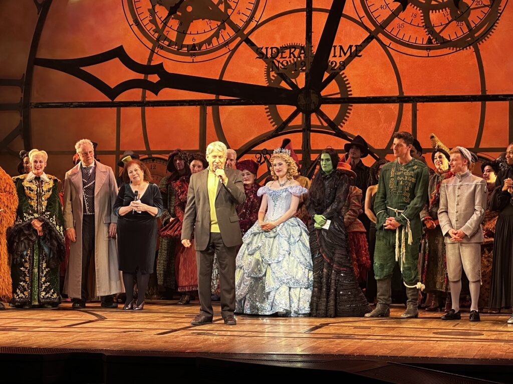 Wicked Composer Stephen Schwartz speaks at the curtain call for the 20th anniversary performance of Wicked. 